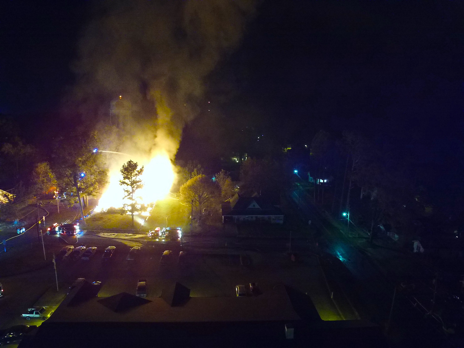 A fire is burning in the dark sky.