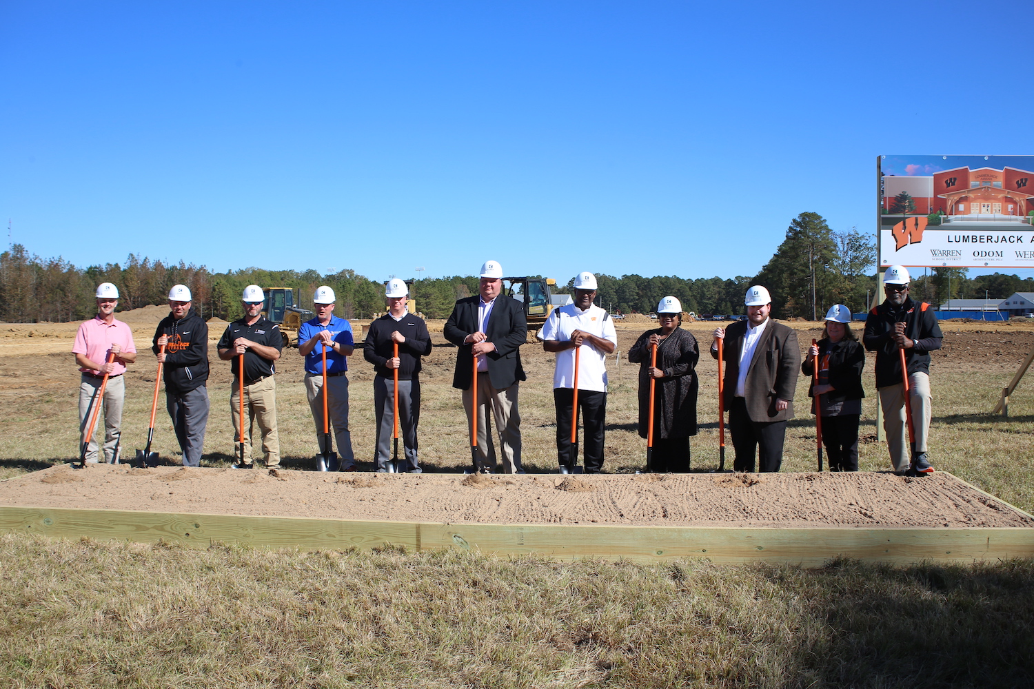 A group of people standing next to each other.