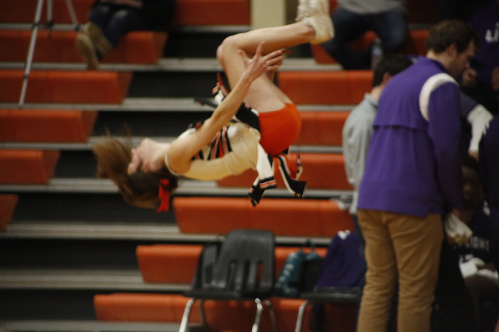 A person doing a flip trick in the air