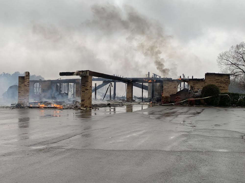 A bridge that has been burned down.
