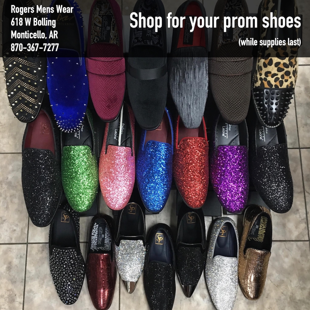 A bunch of shoes are on the floor
