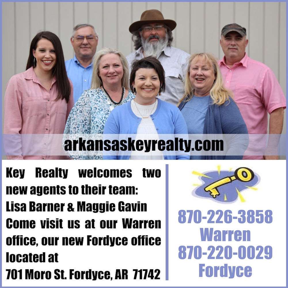 A picture of the key realty team and their family.