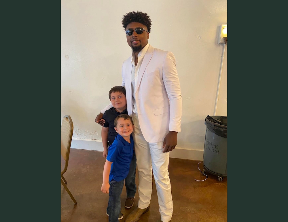 Photos from inside the Treylon Burks NFL Draft watch party