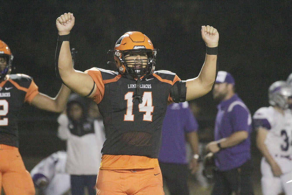 A football player is celebrating his touchdown.