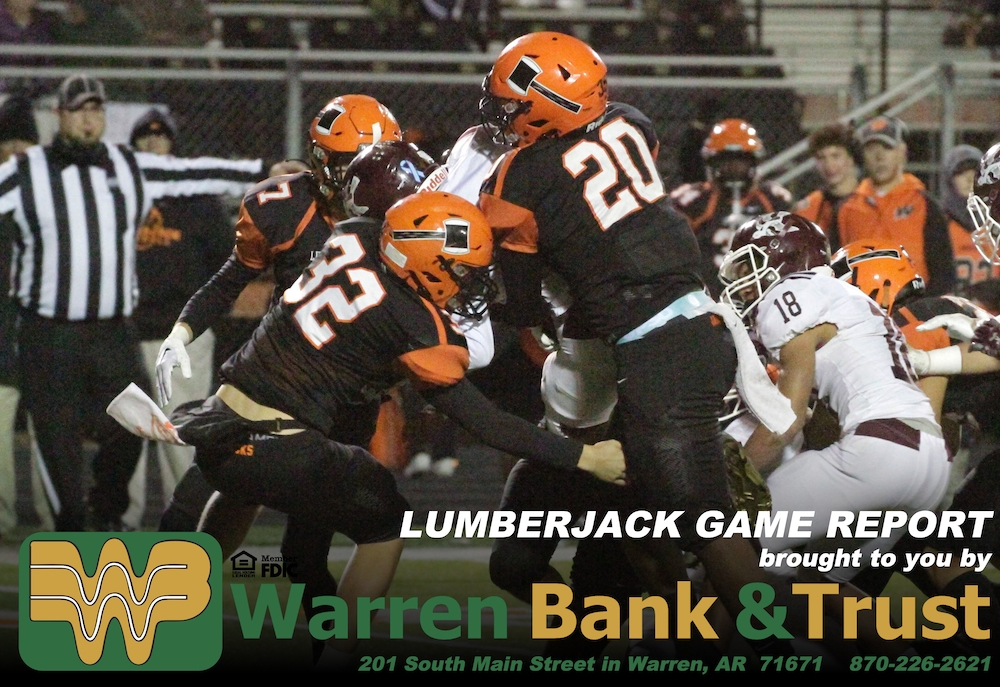 A football team is playing on the field.