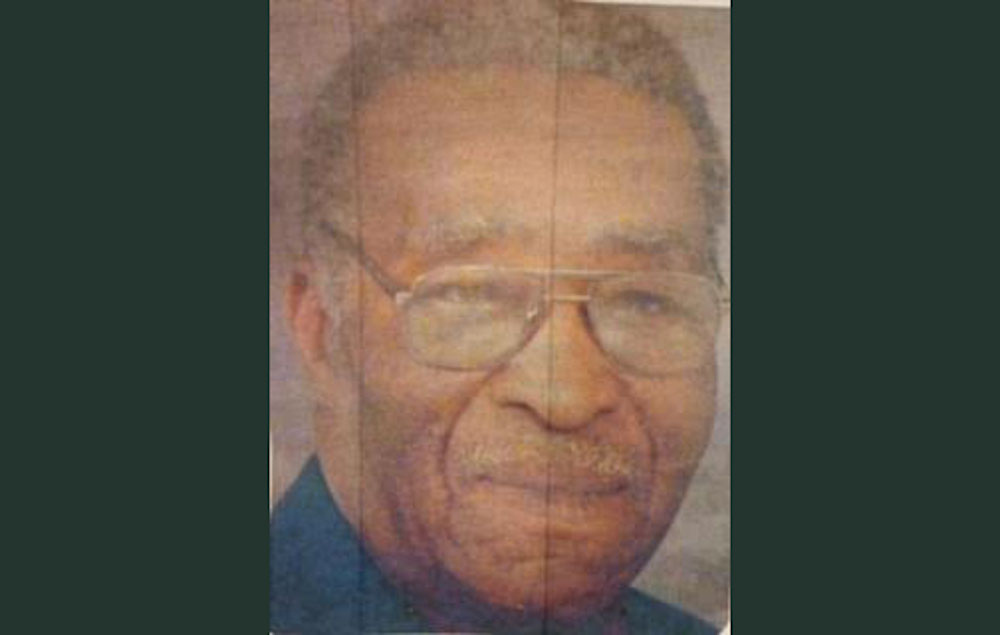 A picture of an older man with glasses.