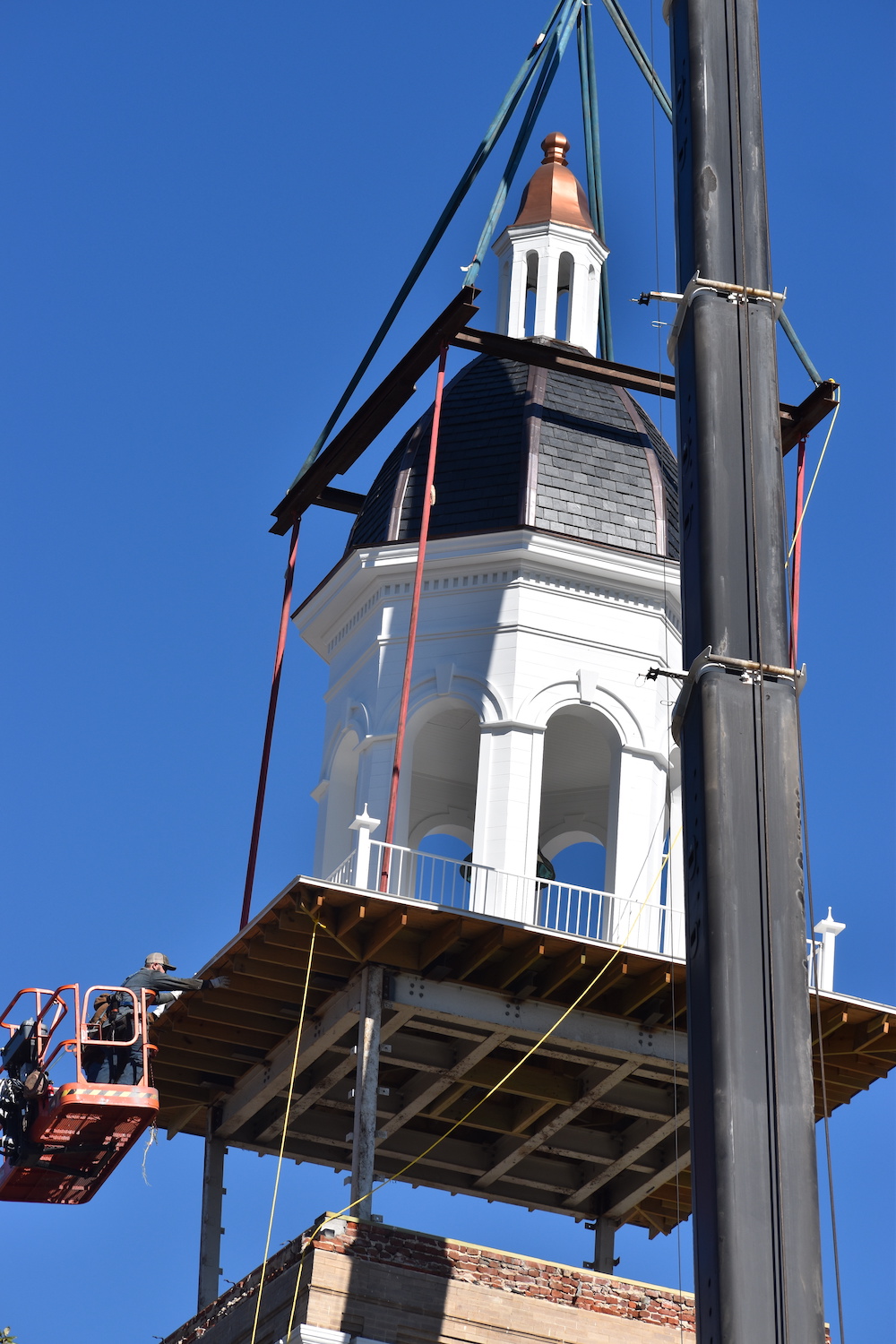 A building being built with scaffolding around it.