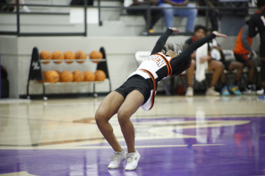 A person doing a trick on the floor
