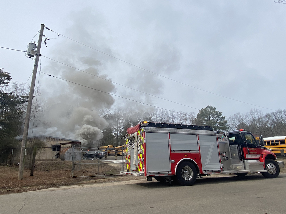 A fire truck is parked on the side of the road.