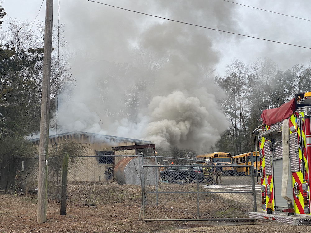 A fire that is burning in the middle of a building.