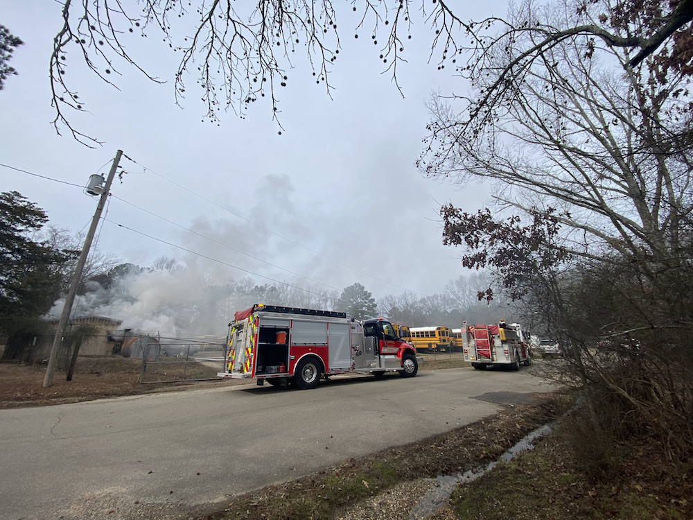 A fire truck is parked on the side of the road.