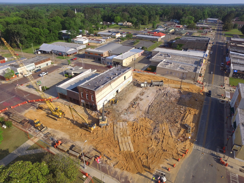 An aerial view of a construction site with buildings.