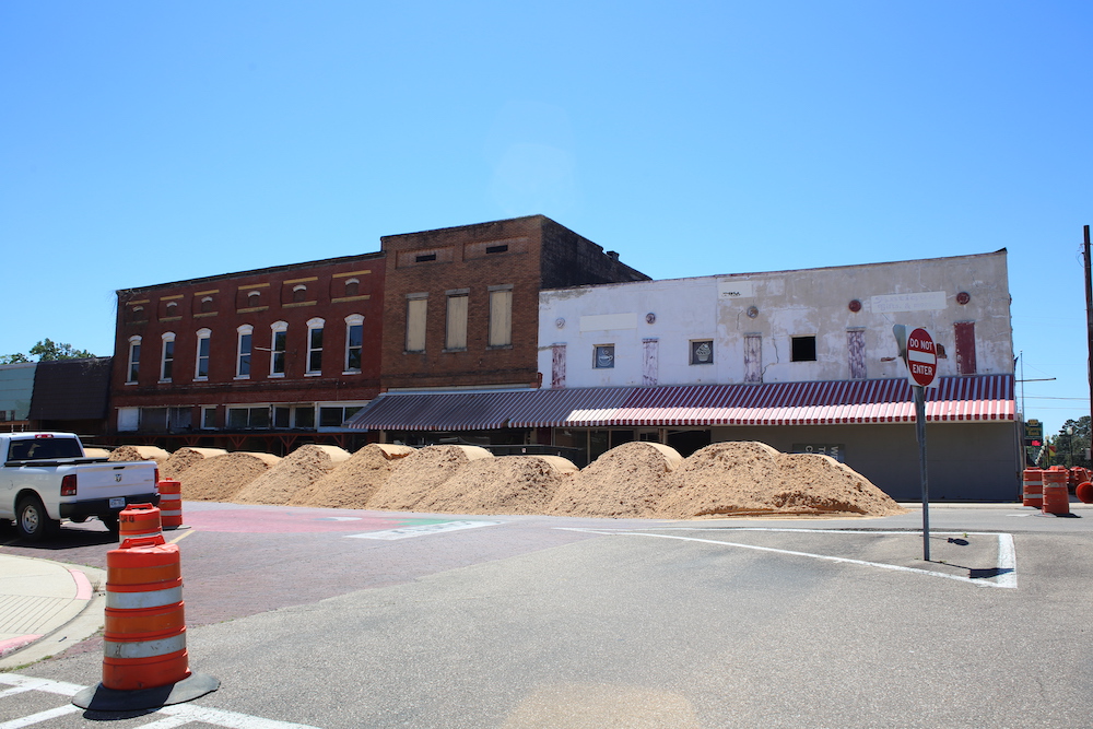 A building that is being built in the street.