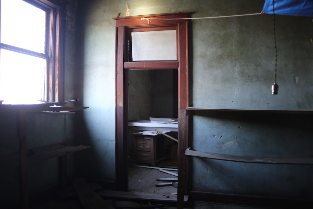 A room with a door and window in it
