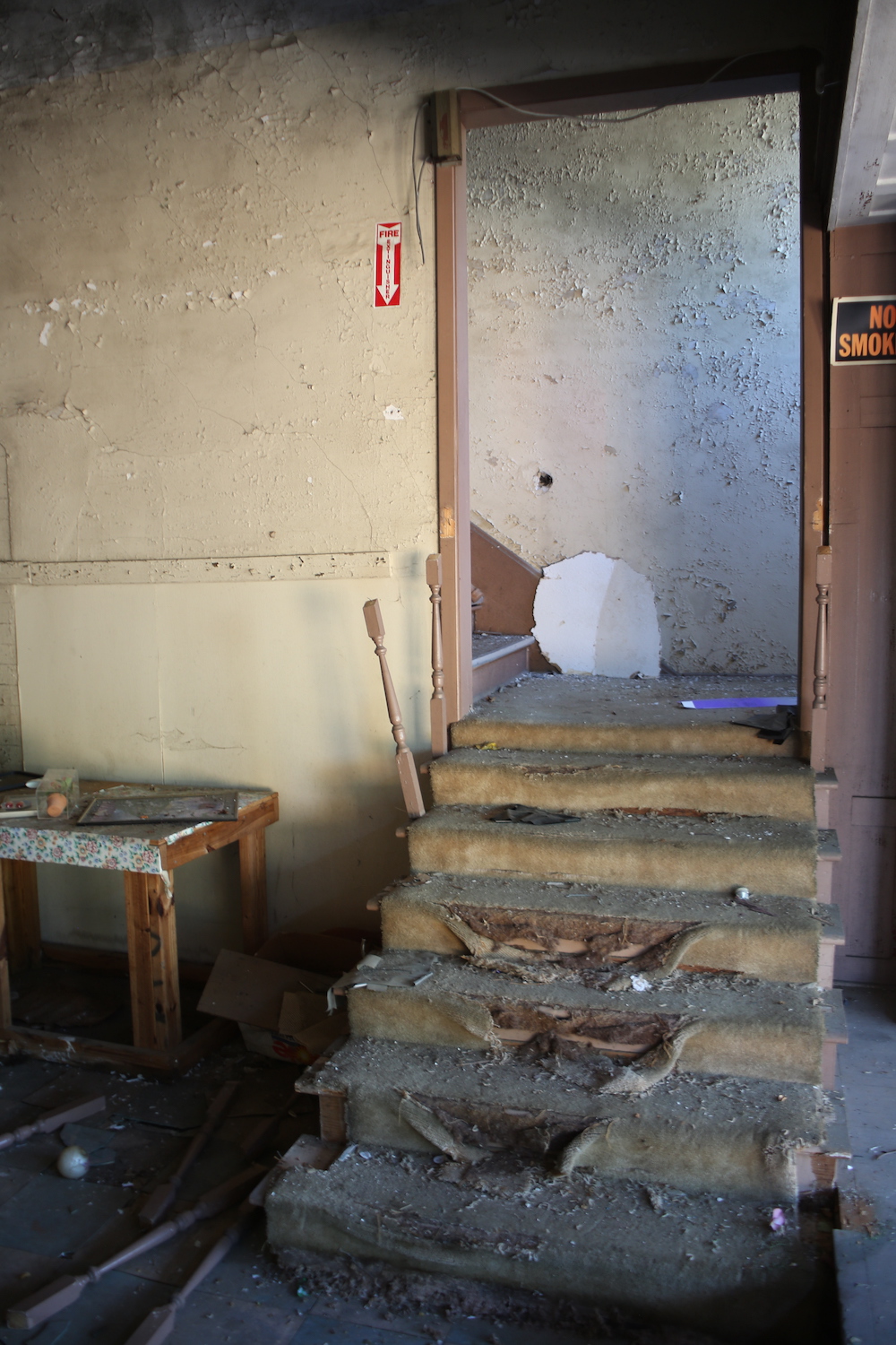 A room with stairs and walls in it