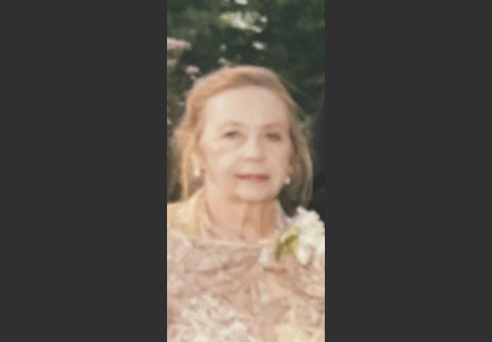 A woman in a dress and flowers