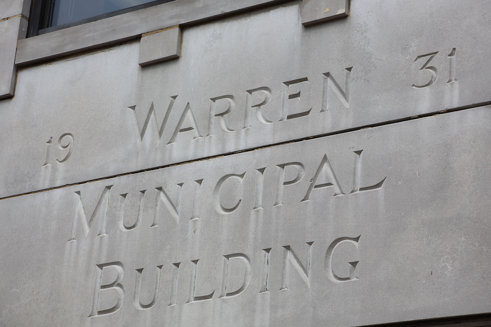 A close up of the words warren municipal building