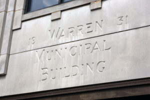 A building with the name of warren 3 and the address for the municipal building.