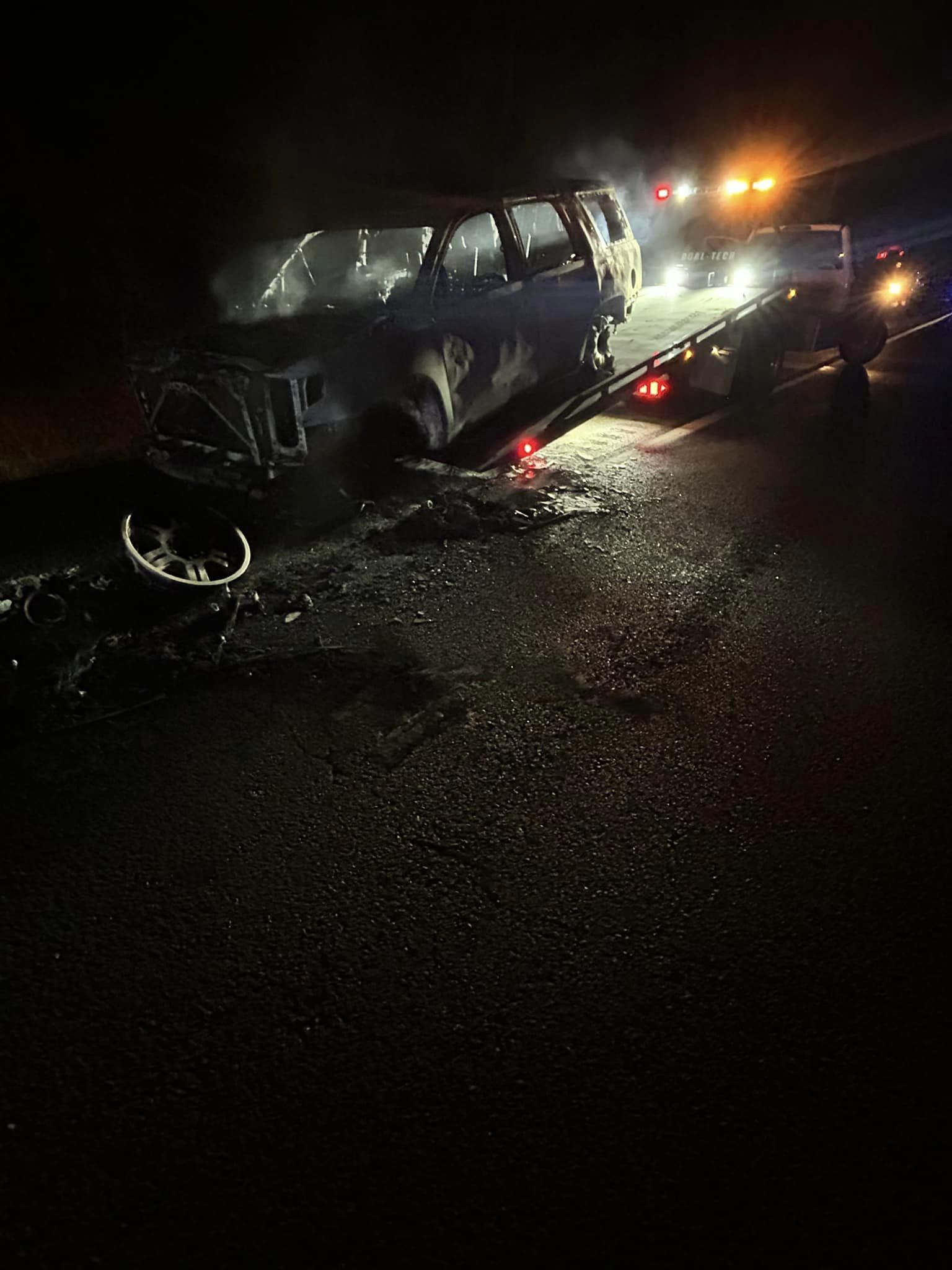 A car that has been smashed by another vehicle.