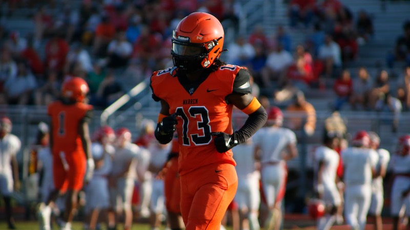 A football player running on the field