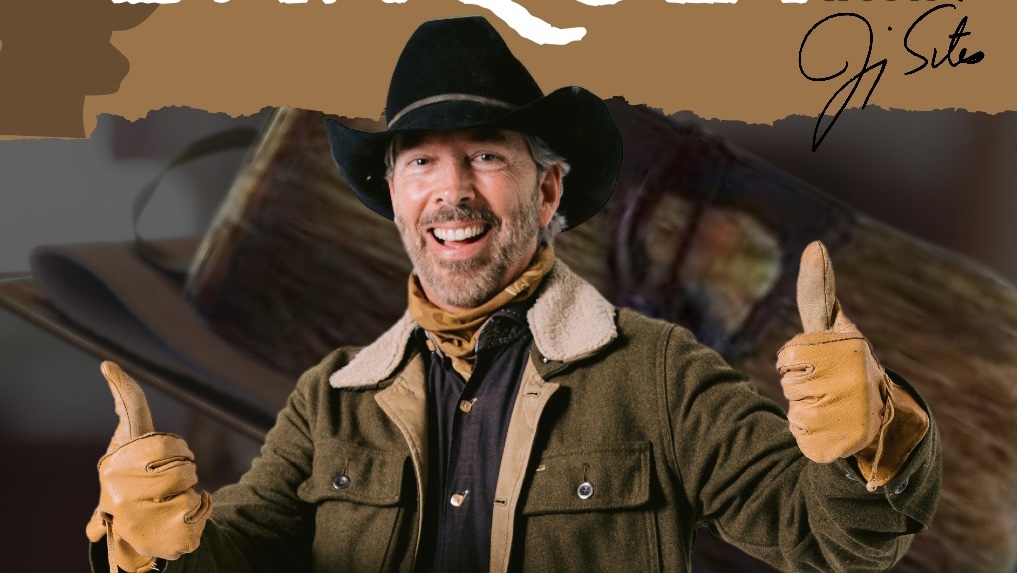 A man in a cowboy hat and jacket.