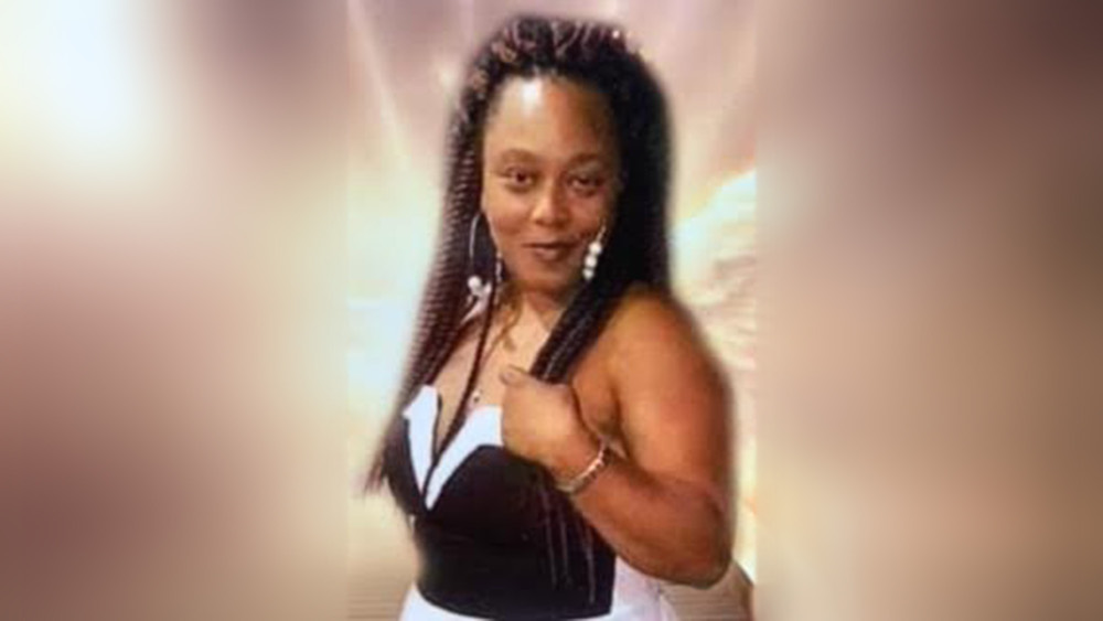 A woman with long hair and a white dress.