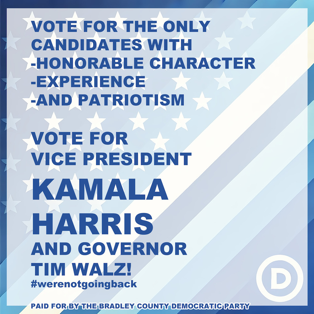 A blue and white poster with the words vote for kamala harris