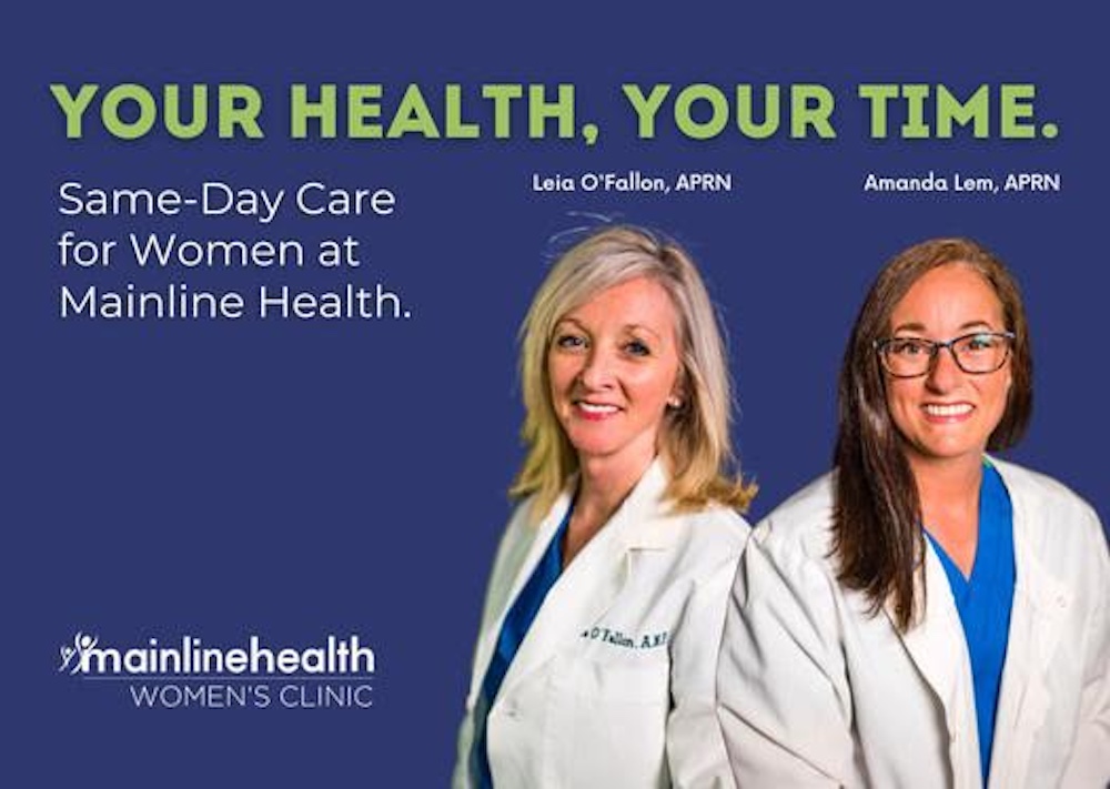 Two women are standing next to each other.