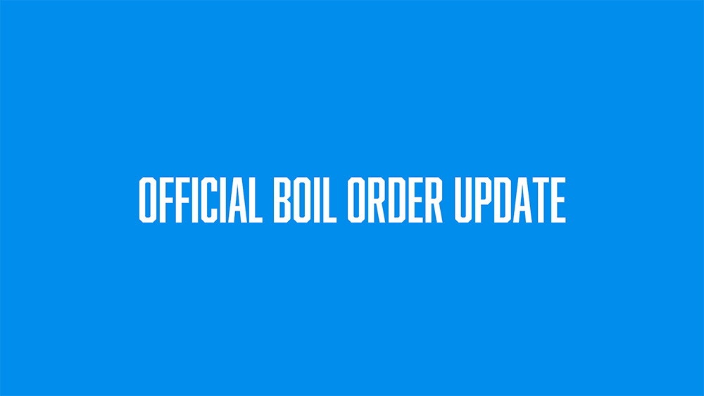A blue background with the words official boil order update.