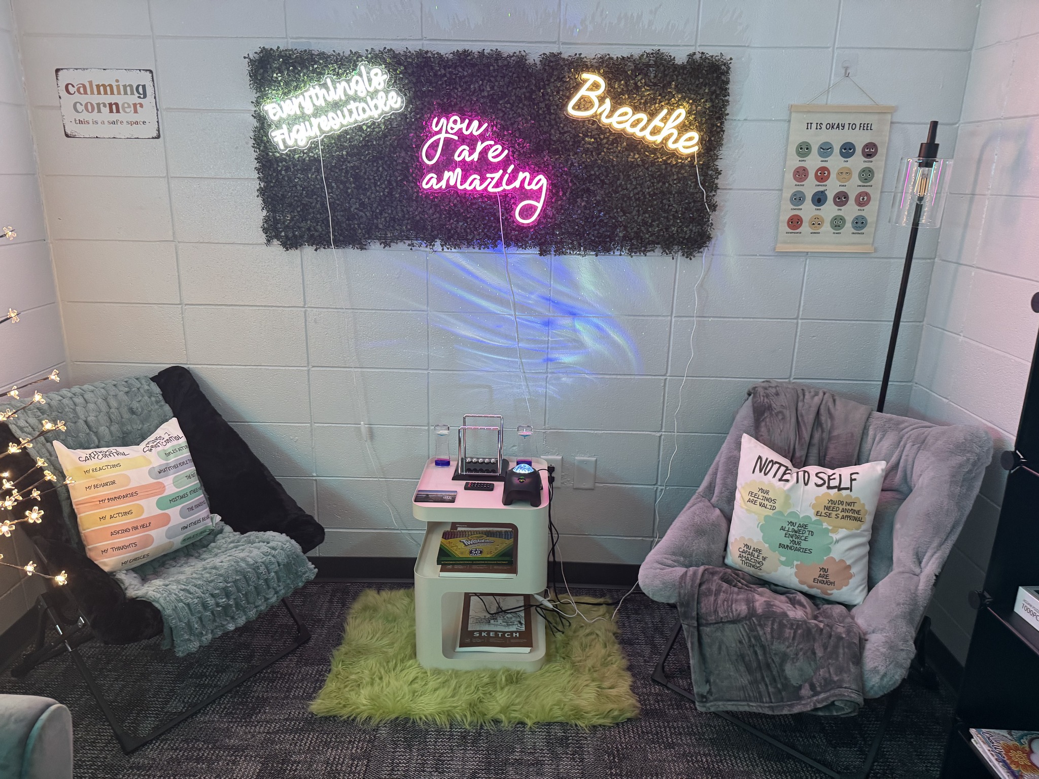 A room with two chairs and a table