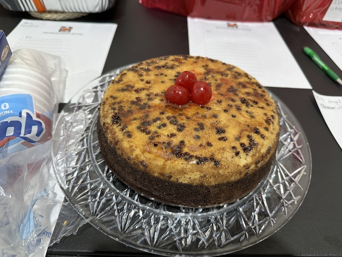 A cake sitting on top of a glass plate.