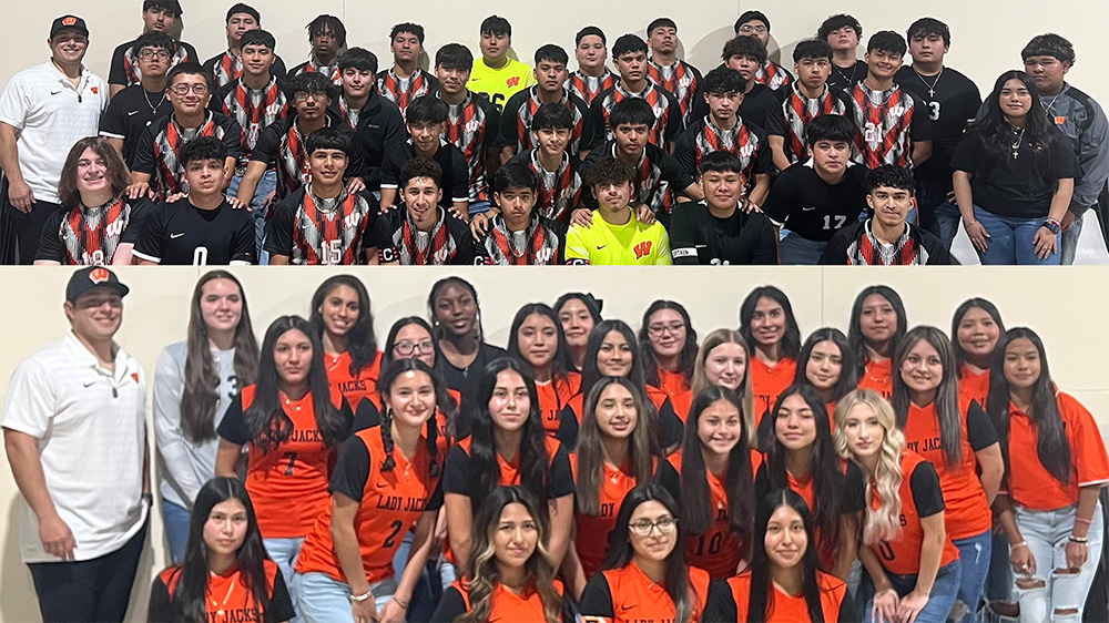 A group of people wearing orange shirts and black ties.