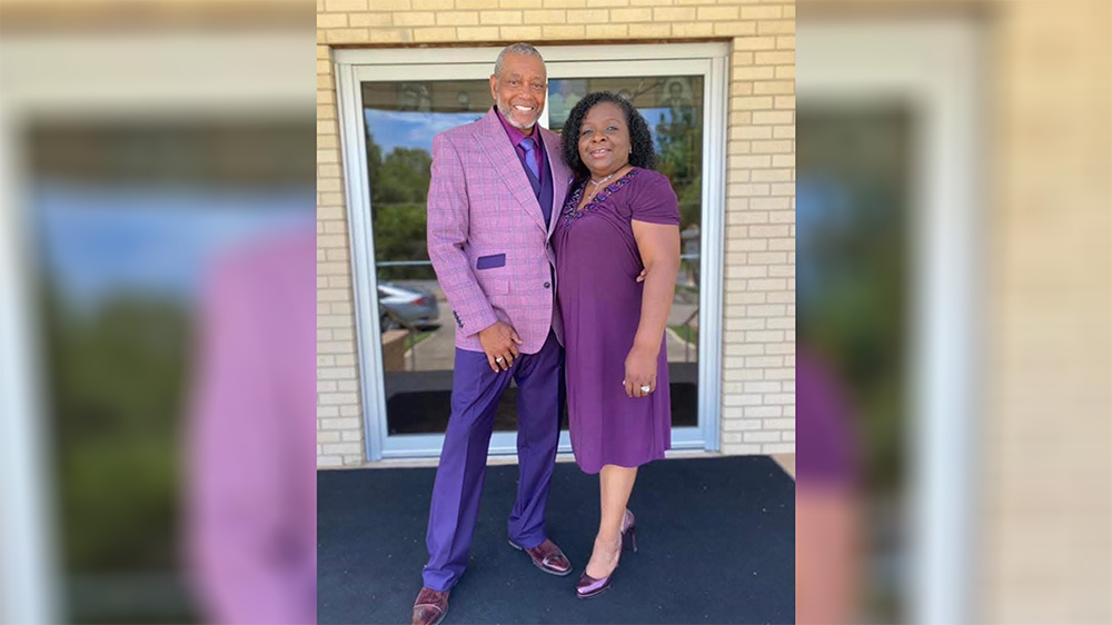 A man and woman standing next to each other.