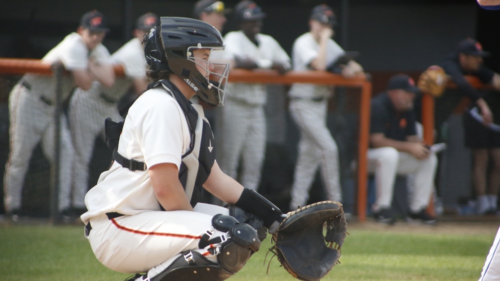 A baseball player in the middle of a game.