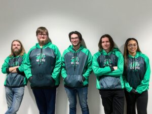A group of people standing next to each other.