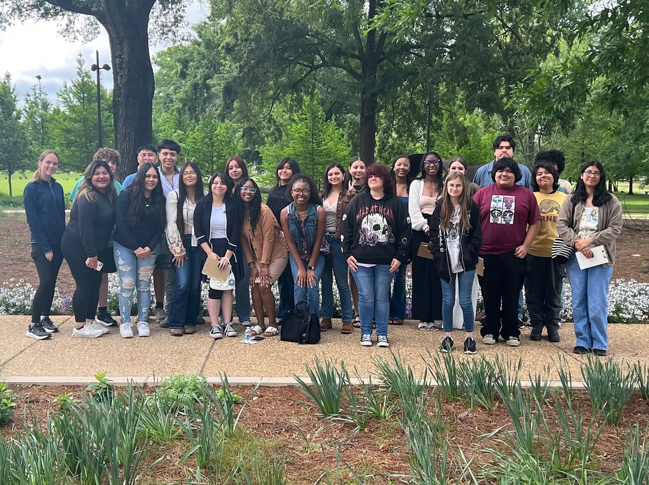 A group of people standing next to each other.