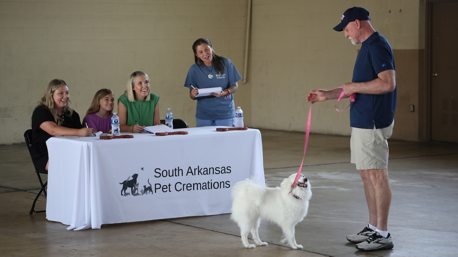 Paws and Applause: Top Dogs Crowned at Pink Tomato Festival Dog Show