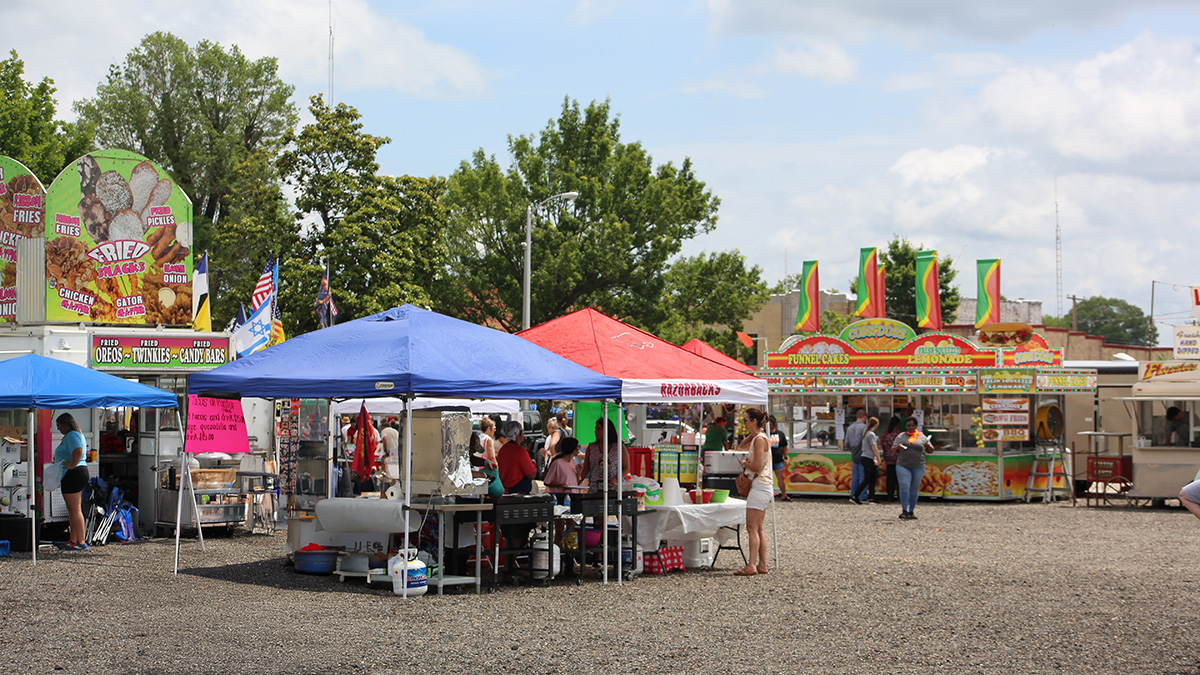 Midday Check-In: Tomato Festival Buzzes with Activity as More Events Roll Into Friday Night
